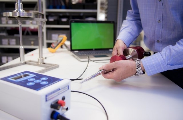 Image of staff calibrating a viscometer